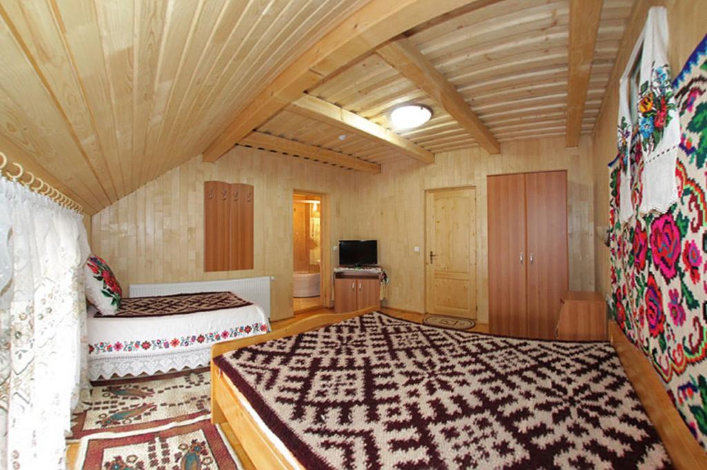 Pensiunea Sub Cetate La Matei Onceşti Chambre photo
